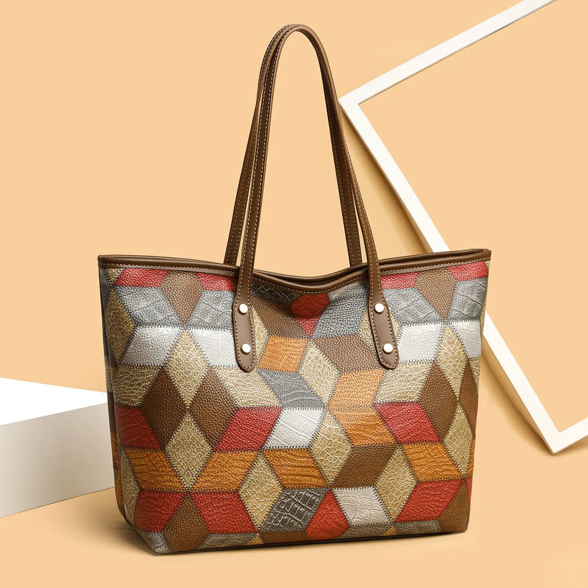 Women's large capacity PVC shoulder handbag with sandwich pockets in blue brown colour