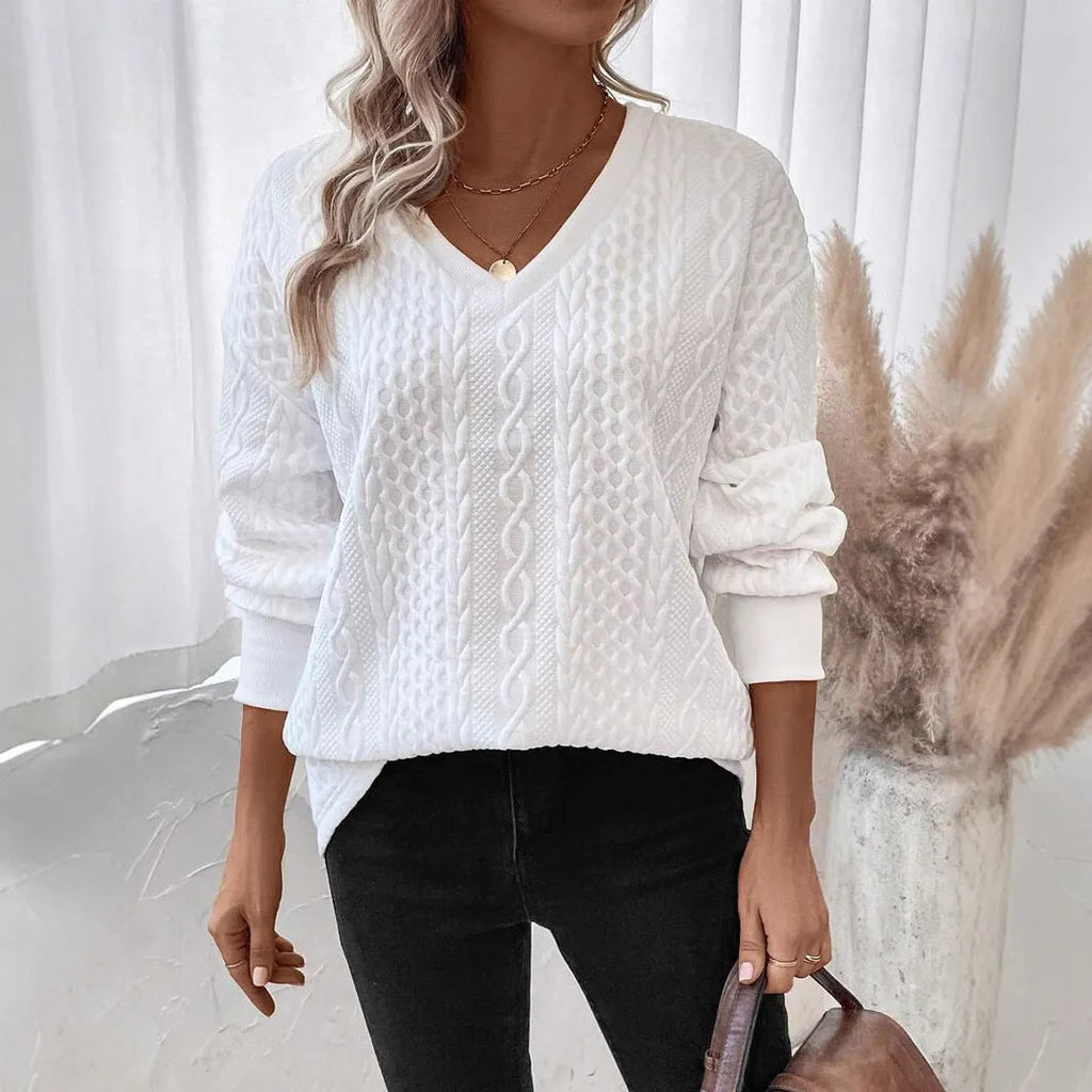 Milky white loose fit long sleeve T-shirt with 3D pattern detail on mannequin