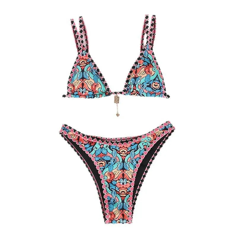 Retro four-colour print women's bikini swimwear in polyester fabric on a mannequin.