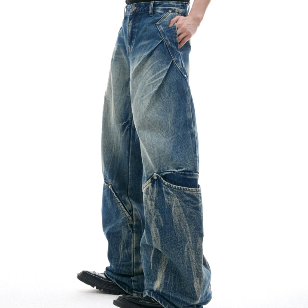Men's Verdant Blue jeans with a retro washed burst pattern and loose curved knife fit