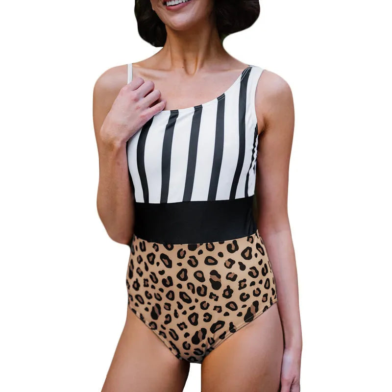 Leopard print women's one-piece swimsuit with asymmetric collar and high waisted briefs style.