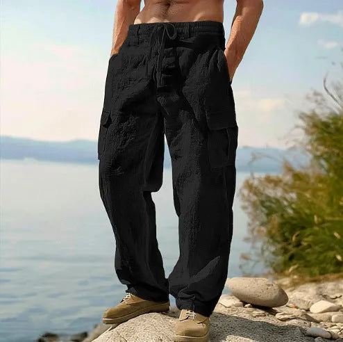 Men's cotton wide-leg casual trousers in light army green colour showing mid-waist design and relaxed fit