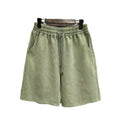 Men's loose fit distressed casual shorts in solid colour on hanger