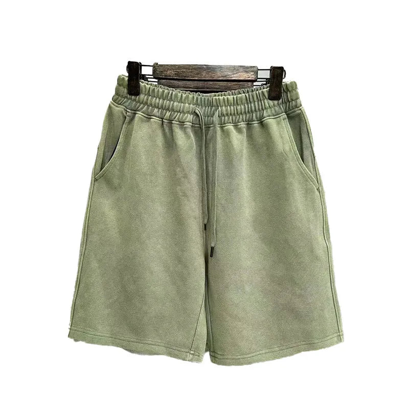 Men's loose fit distressed casual shorts in solid colour on hanger
