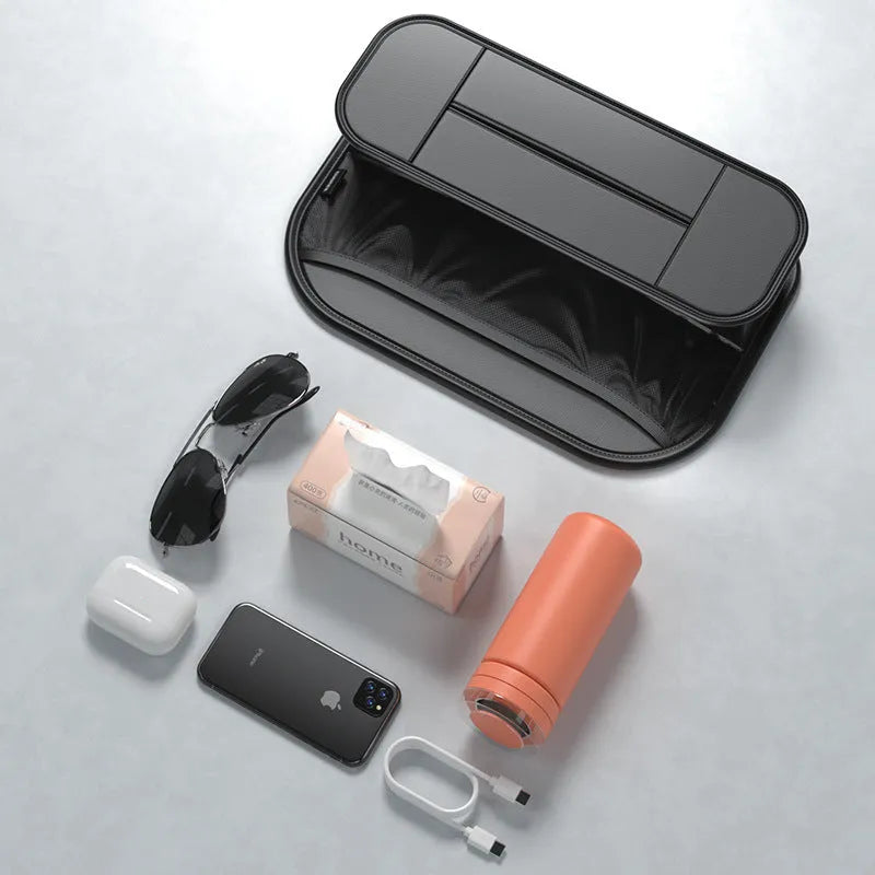 Black leather car seat rear storage bag showing dimensions and compartments for vehicle organisation
