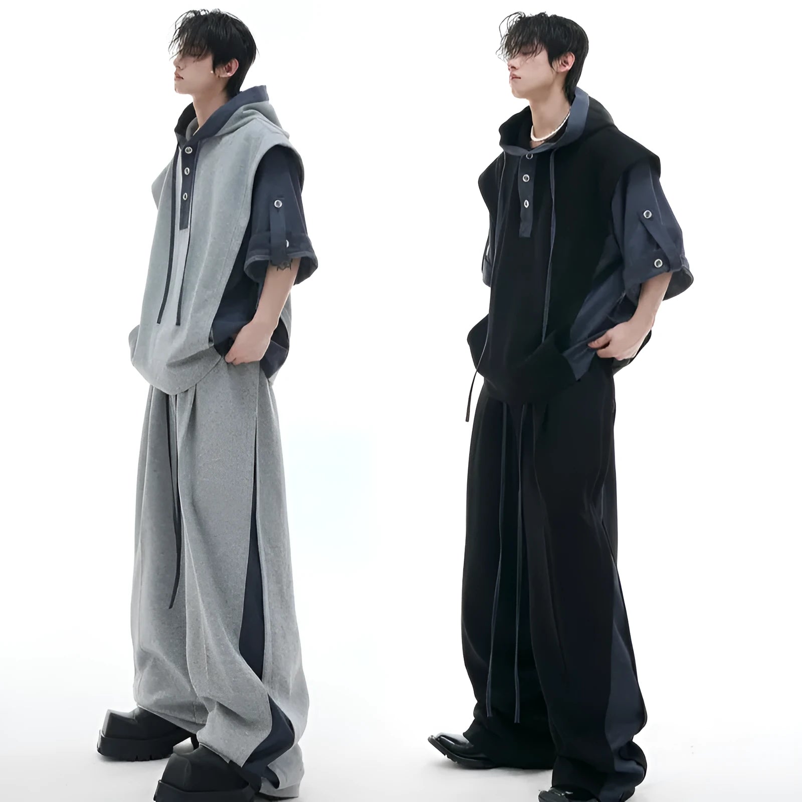 Men's hooded short sleeve sports suit with matching trousers in black or grey polyester fabric