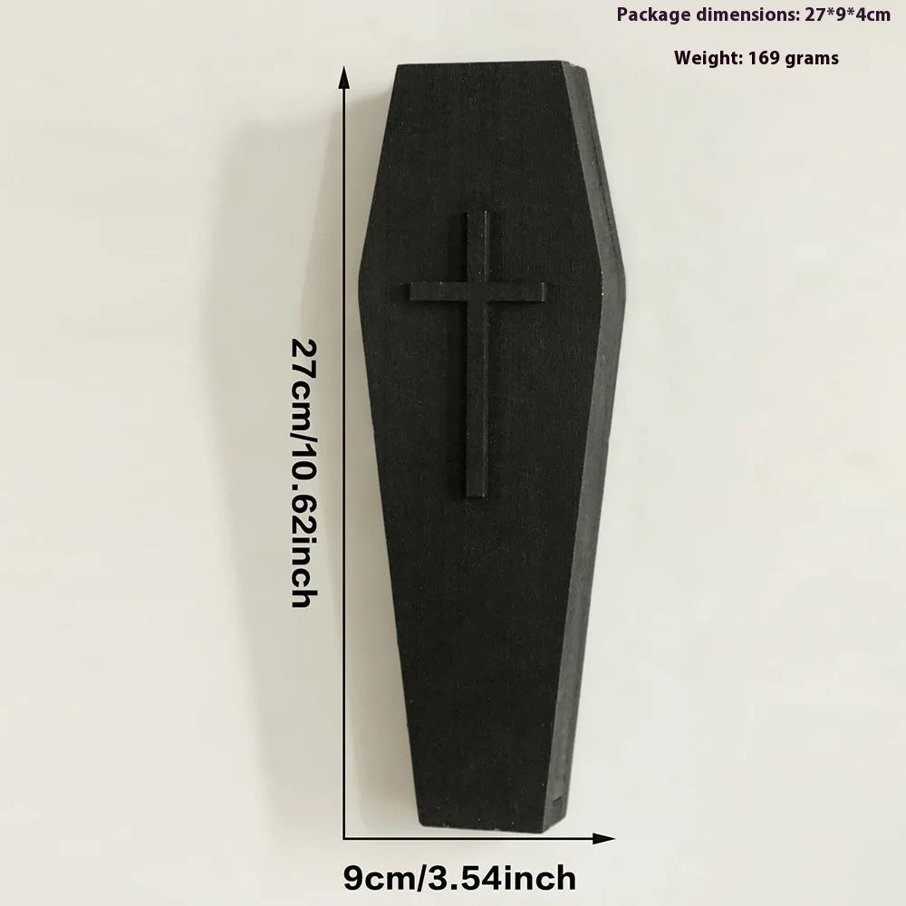 Black cross-shaped wooden wall vase shelf for decorative display measuring 27cm wide by 9cm tall