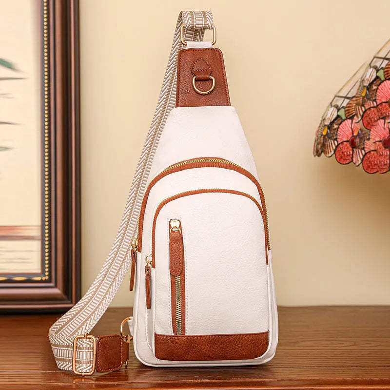 Women's soft PU chest bag in messenger style with crossbody strap and organised compartments