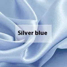 Solid colour silk duvet cover laid flat, showing double-sided construction and smooth texture.