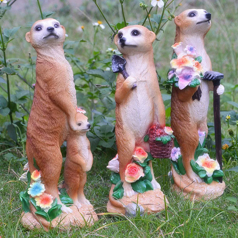 Straw hat mongoose garden ornament figurine in resin plastic.
