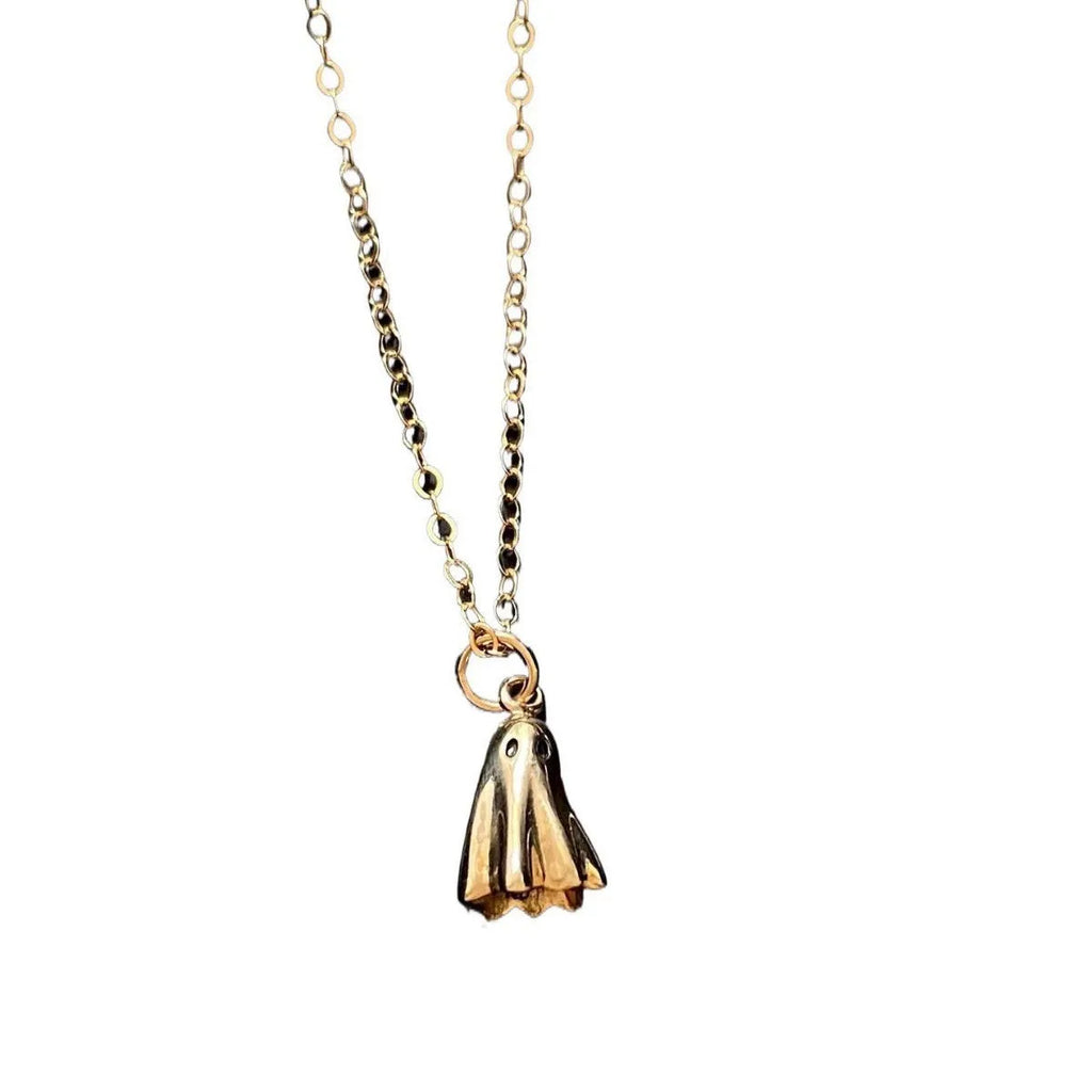 A ghost pendant necklace on a twisted stainless steel chain, showing the titanium steel electroplated pendant.