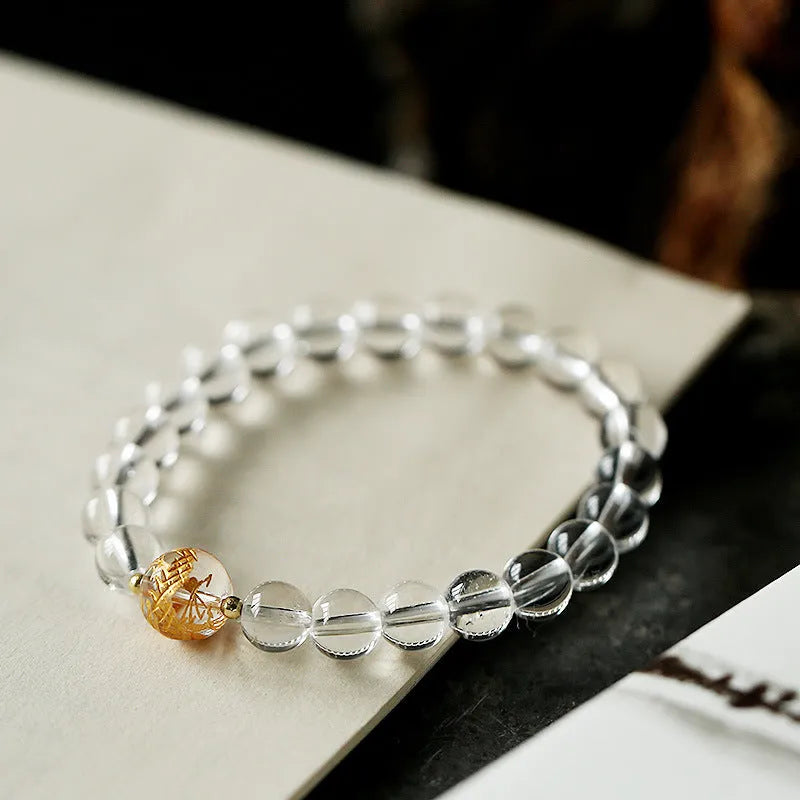 Geometric unisex bracelet with obsidian, black agate, and white crystal beads and dragon charm