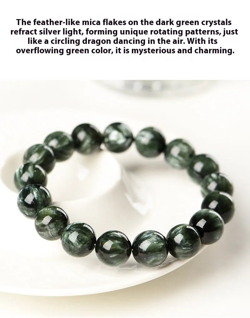 Green Dragon Crystal bracelet with round 8-9mm beads on a wrist.