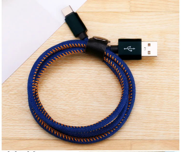 Cowboy-style denim USB Type-C charging cable with aluminium connectors in black, blue, and red colour options