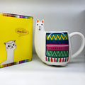 White ceramic mug with handle featuring a cartoon alpaca pattern on the side