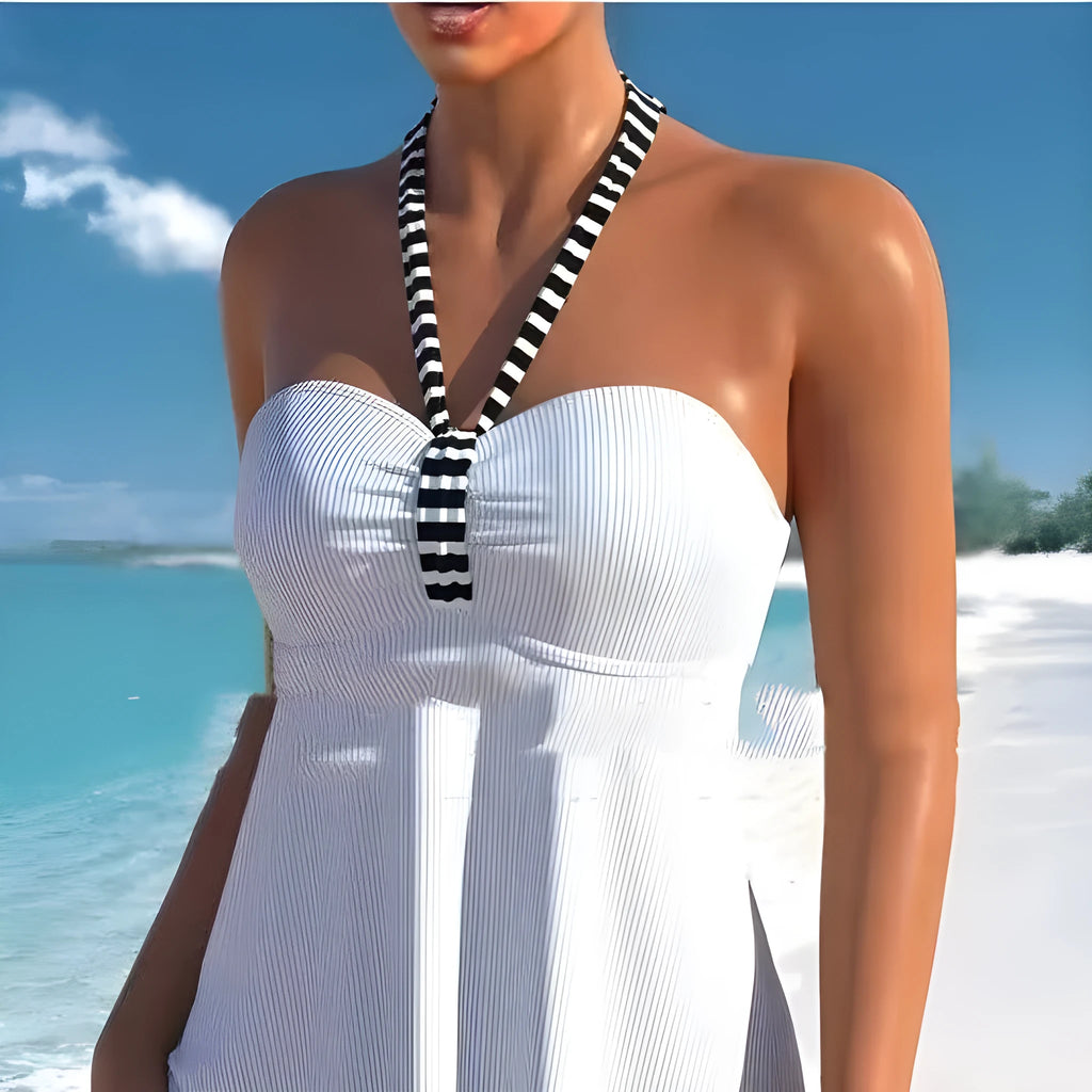 White off-shoulder women's swimsuit with black and white stripes, briefs style.