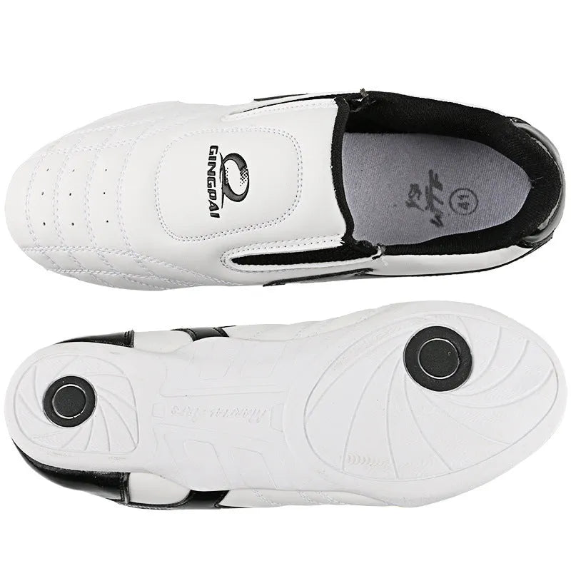 Black and white children's martial arts shoes with soft sole and widened fit for boxing training