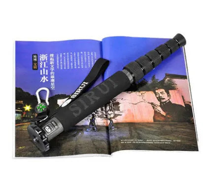 Black carbon fibre SLR camera monopod extended to maximum height of 1540mm