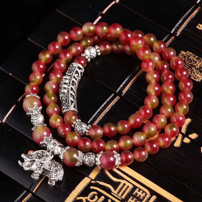 Natural watermelon crystal Chinese knot bracelet with elephant-style beads