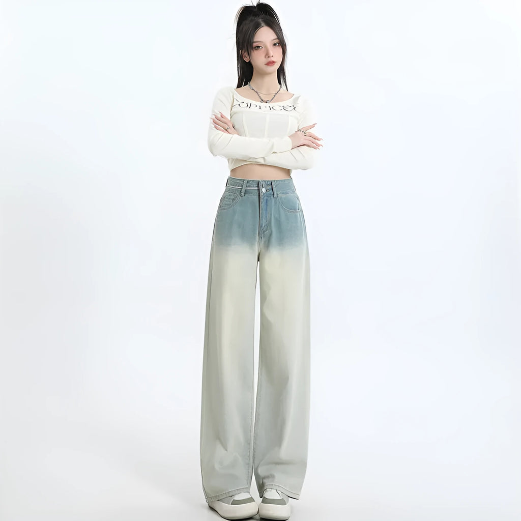 Women's gradient blue denim straight-leg trousers with wide-leg styling on size chart background