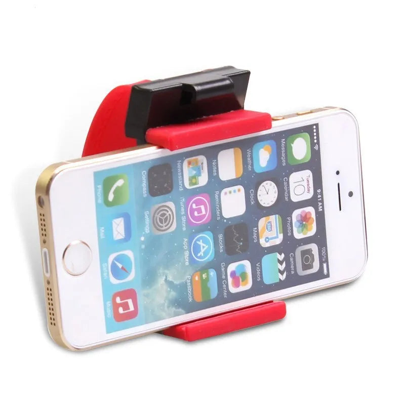 Universal black steering wheel phone mount holder clipped onto a car wheel