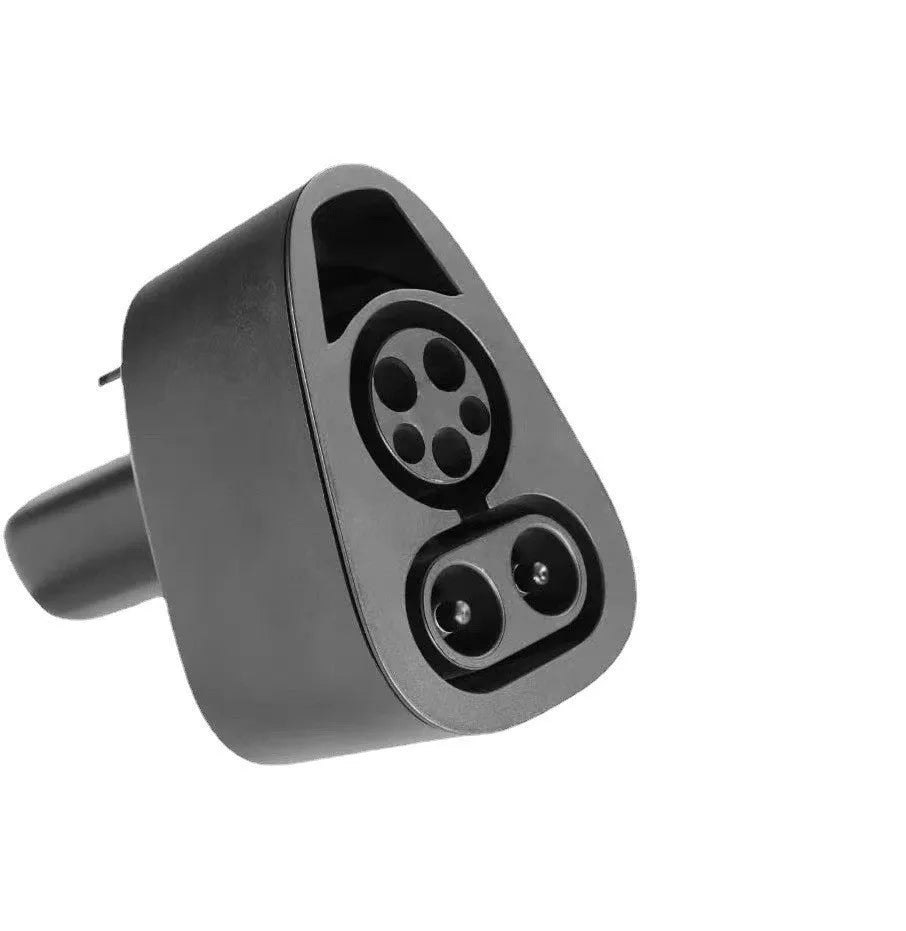 Black Tesla charging plug converter adapter for American standard EV charging points.