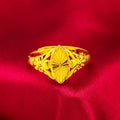 Gold electroplated open flower ring with geometric texture on adjustable brass band