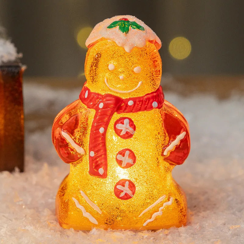 Glowing gingerbread man Christmas ornament with snowman design in plastic construction