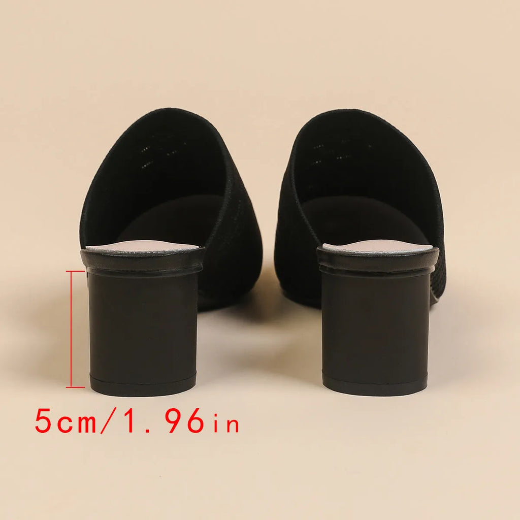Women's black pointed toe sandals with a fabric upper and 5cm chunky rubber heel.