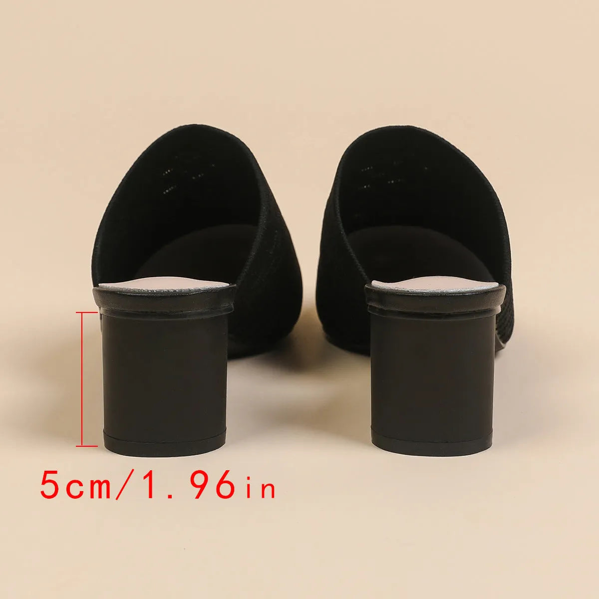 Women's black pointed toe sandals with a fabric upper and 5cm chunky rubber heel.