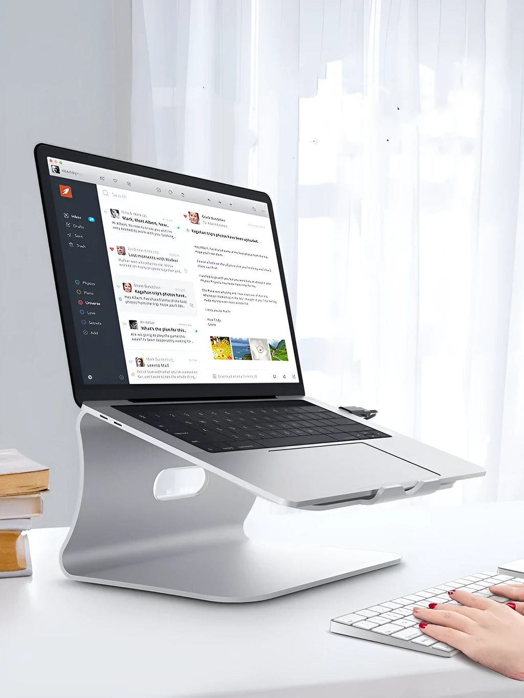 Aluminium alloy laptop cooling bracket with rotary hinge in grey and silver stripe options.