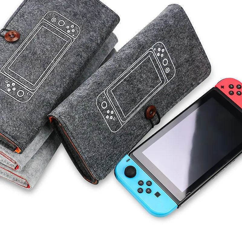 Black Nintendo Switch felt pouch bag showing game card slots and double layer storage compartments