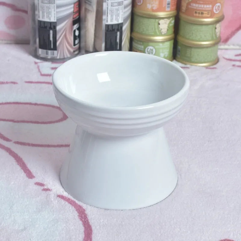 Ceramic pet bowl with high foot design showing anti-tumble stability feature