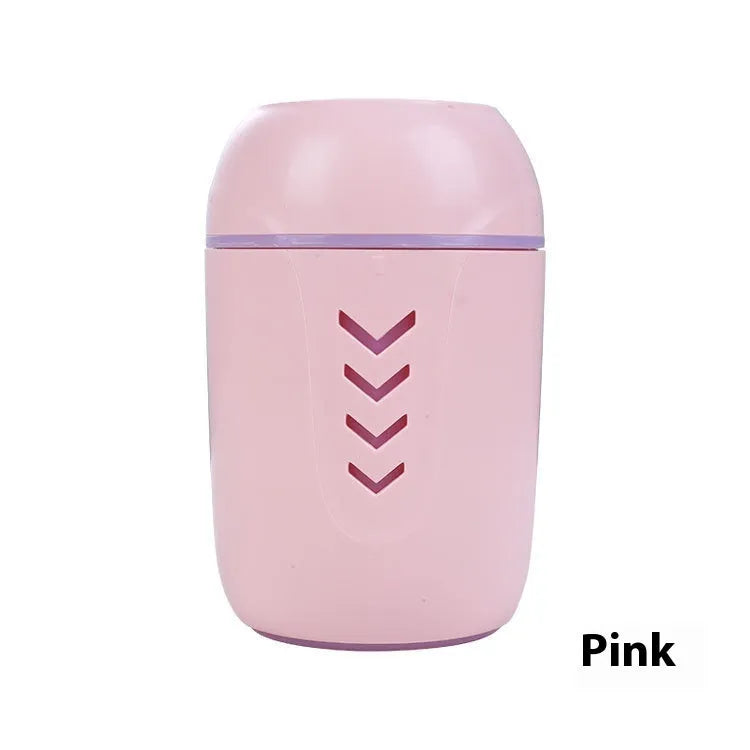 Round portable air purifier in white, pink or blue with USB cable for desktop or vehicle use