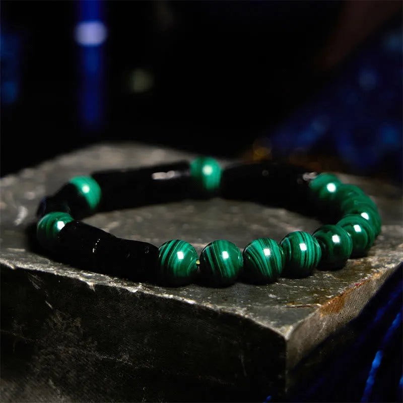 Natural obsidian stone bracelet with constellation design on 8mm beads.