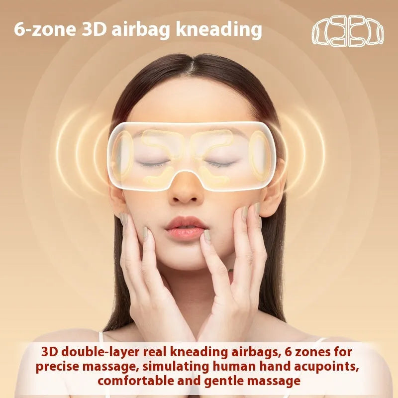 White rechargeable eye massager with hot compress and airbag massage functions