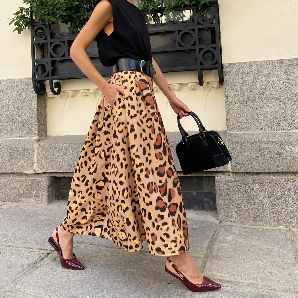Women's brown leopard print A-line skirt with big hem in polyester fabric