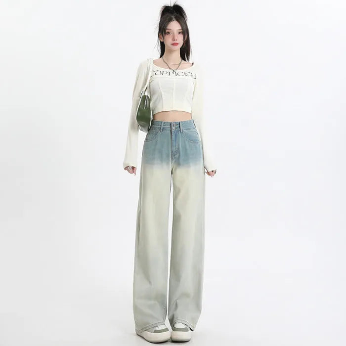 Women's gradient blue denim straight-leg trousers with wide-leg styling on size chart background
