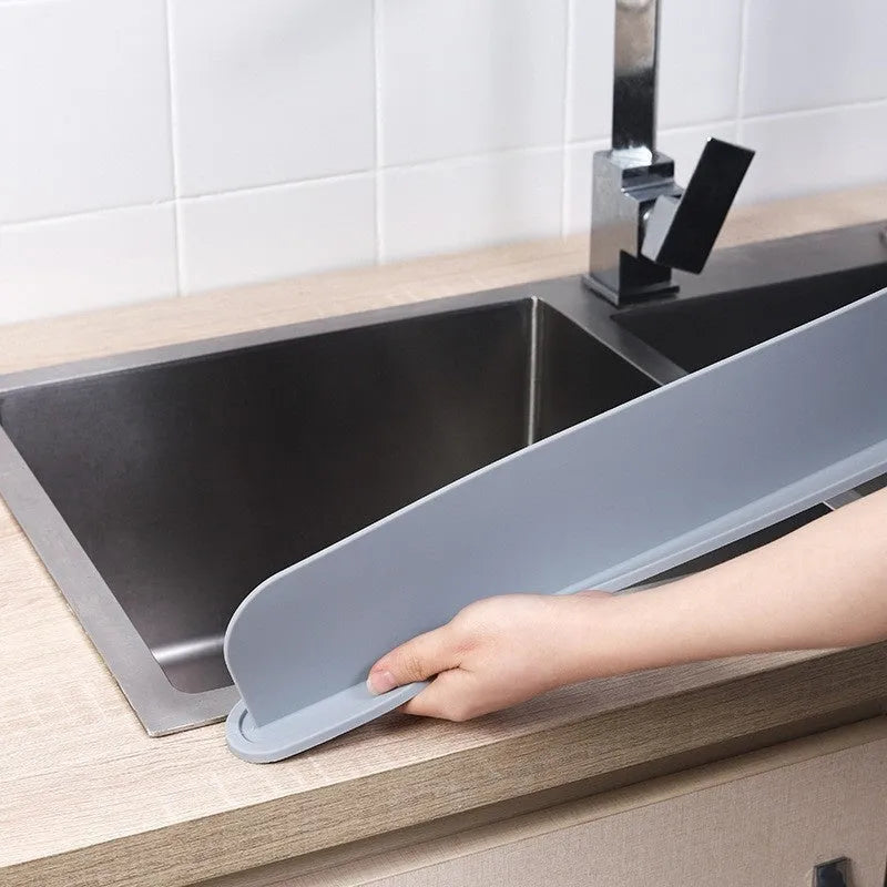 Thick grey silicone kitchen sink water blocking plate showing dimensions
