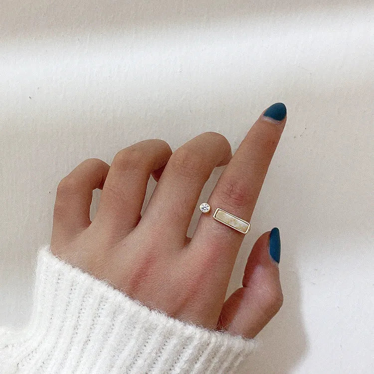 Copper vintage zircon marble ring with electroplated gold finish and adjustable opening, beige colour