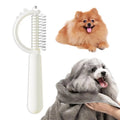 Self-cleaning cat brush with dinosaur shape and stainless steel pins for grooming
