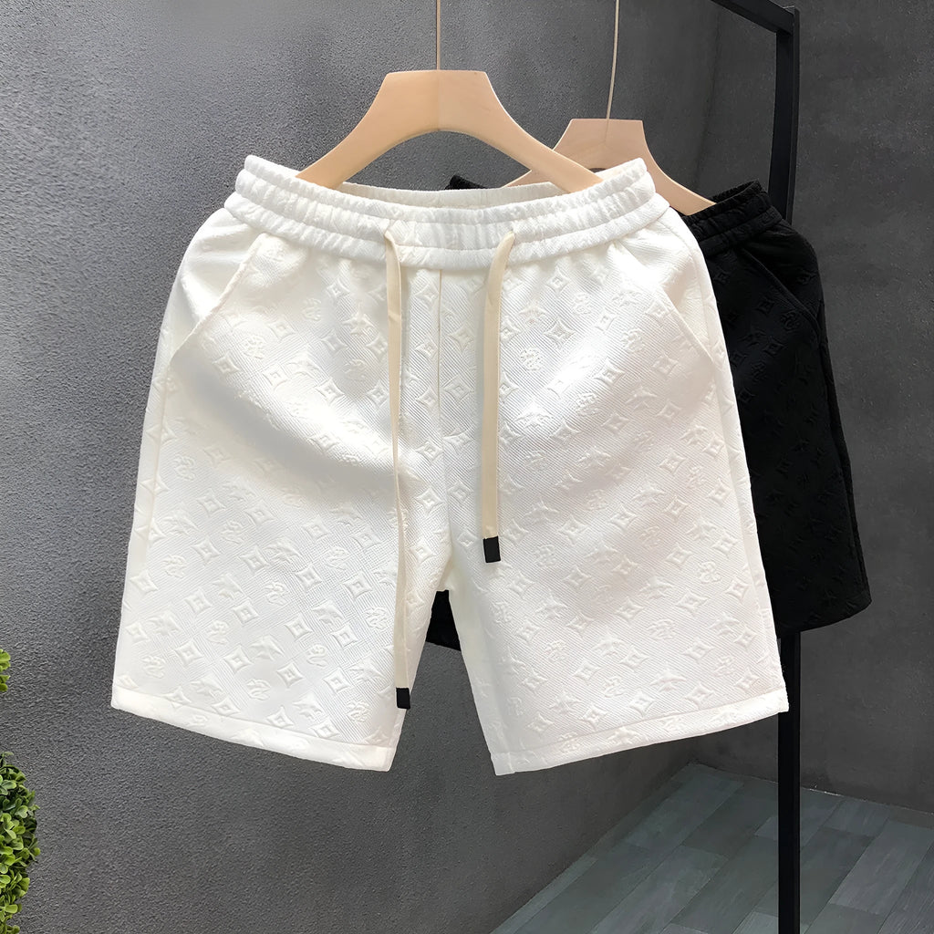 White jacquard shorts for men with straight cut and micro elastic fabric, displayed on a model