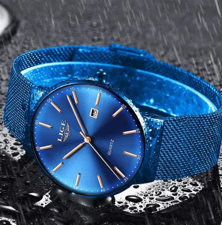 Stainless steel men's analogue wristwatch with 40mm dial in black, blue, or black-blue colour.
