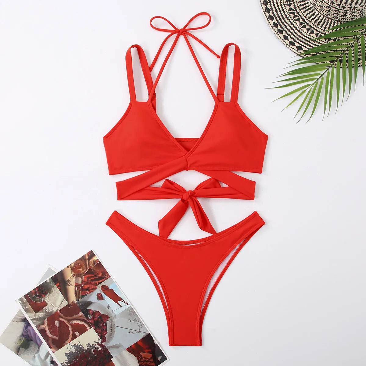 Solid colour strap bikini swimsuit for women in black, shown on a mannequin, sleeveless design with briefs.