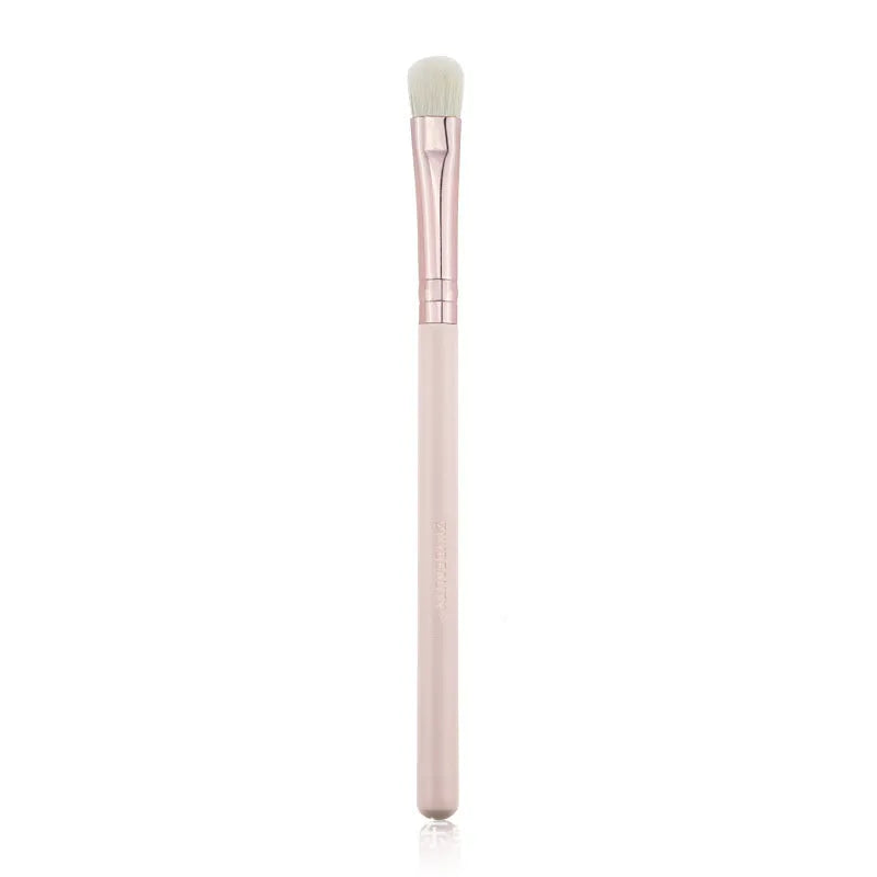 26 pink makeup brushes with wooden handles laid out next to a matching storage bag.