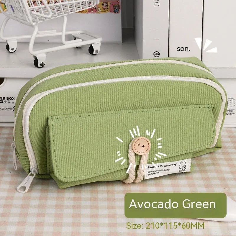 Korean-style canvas pencil case in green, beige, blue, and grey colours storing approximately 80 pens