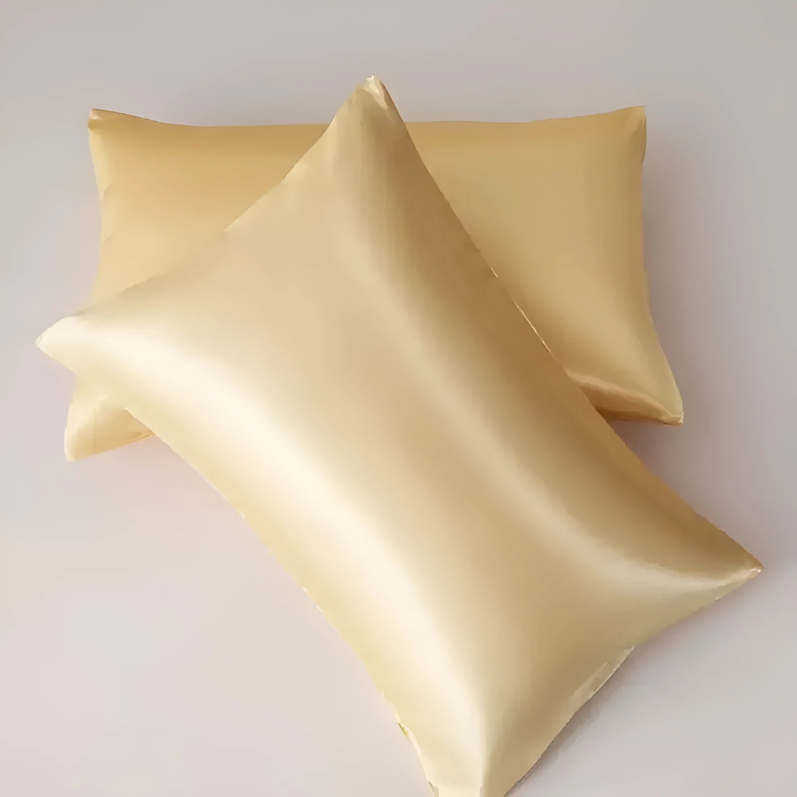 Pair of satin solid colour pillowcases in chemical fibre polyester fabric