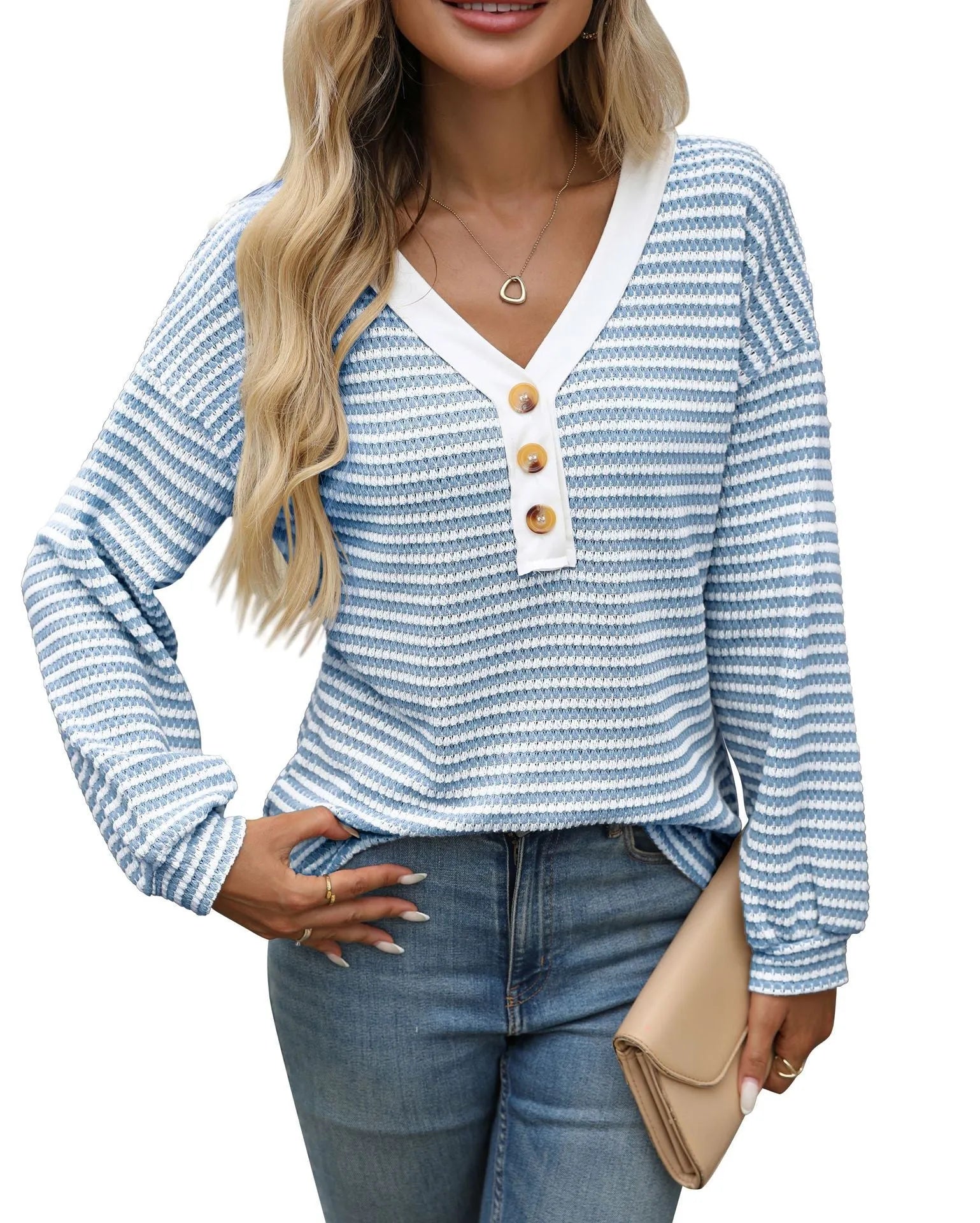 Women's long sleeve V-neck pullover top with button details and patchwork design in loose fit