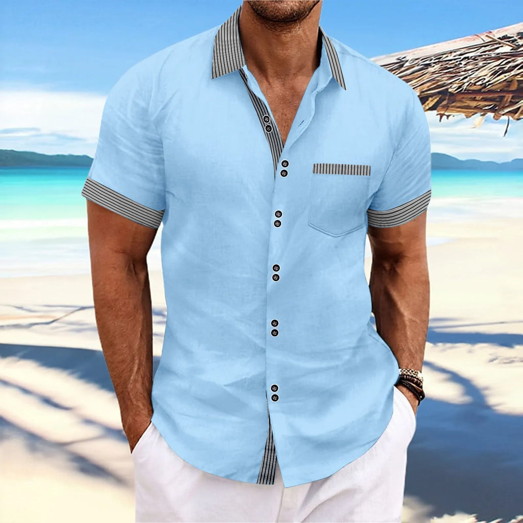 Man wearing a striped, slim fit, pure cotton short sleeve shirt with a double button front in a light blue colour.