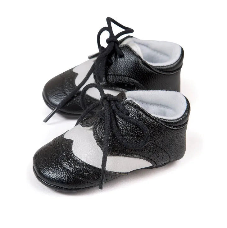 Vintage style baby soft sole walking shoes in synthetic leather available in multiple colours